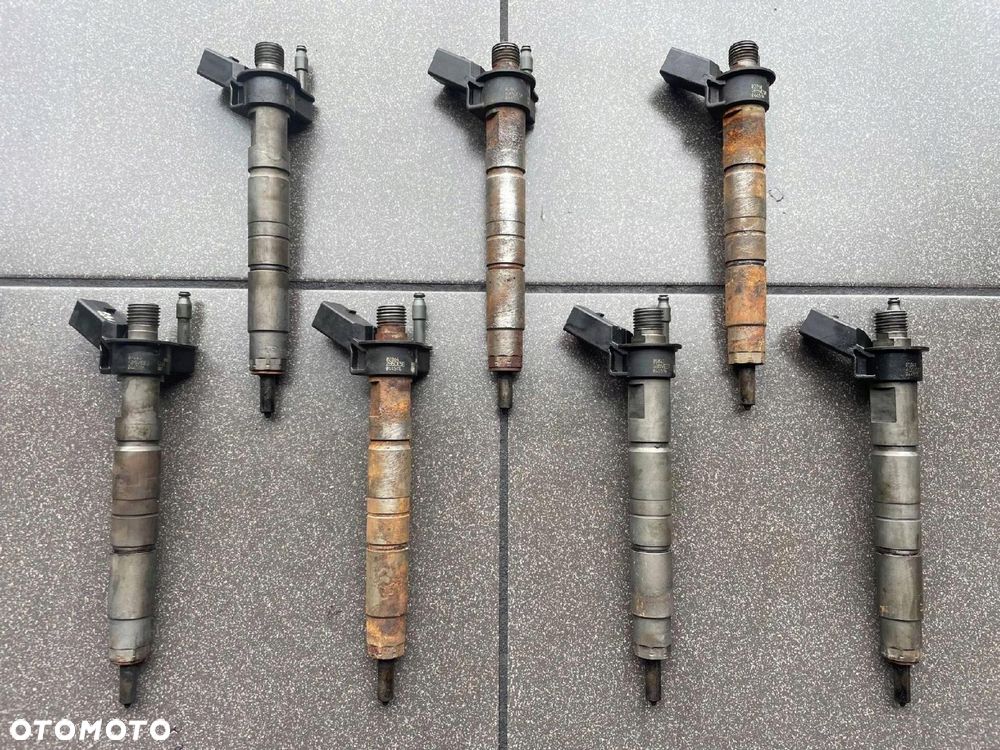 WTRYSKIWACZ 2.0 TD BMW 0445116001 7797877 - 2