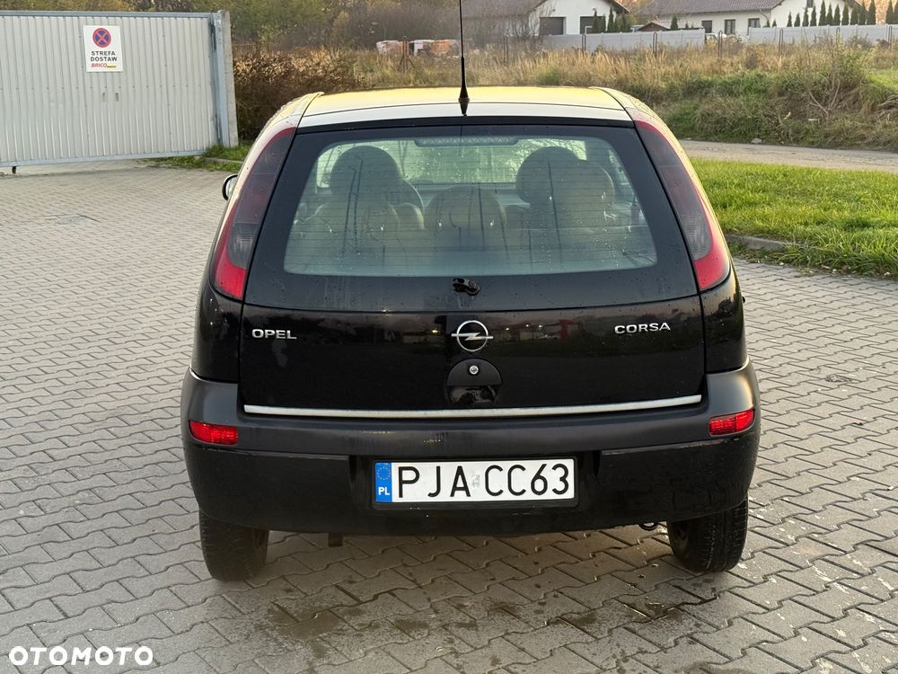 Opel Corsa 1.2 16V Comfort Easytronic - 4