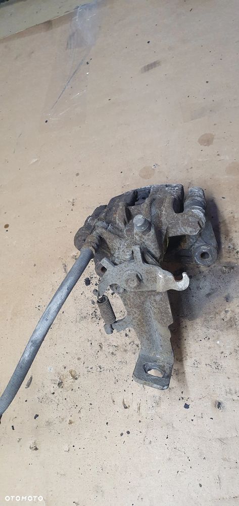 Zacisk hamulcowy lewy tył tylny lewy Nissan Almera - 2