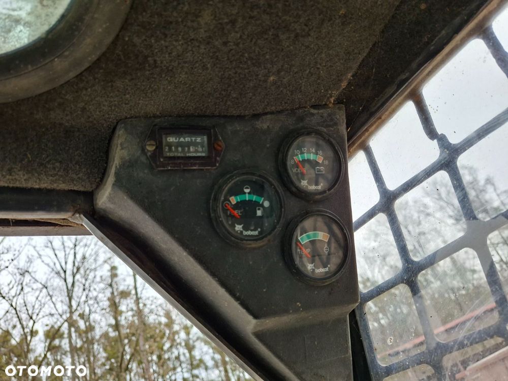 Bobcat 553 4X4 + Melroe Ingersoll-Rand 725S B/H - 19