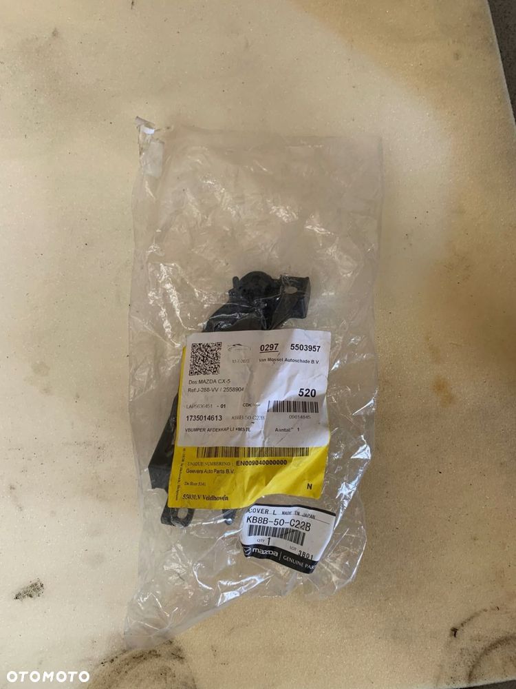 Ramka lampy przeciwmgielnej L Mazda OE KB8B50C22B - 1