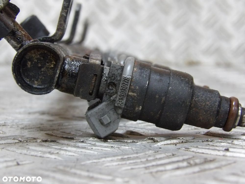 JEEP GRAND CHEROKEE ZJ XJ 4.0 LISTWA WTRYSKOWA WTRYSKI KPL. - 9