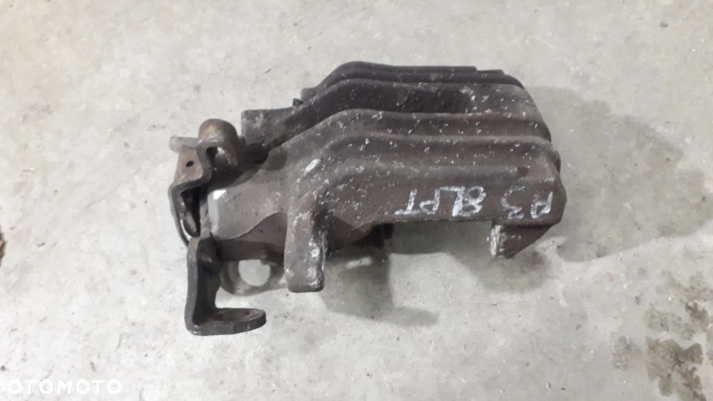 zacisk hamulcowy tył prawy A3 8L 1.6 lift
