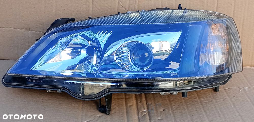 Xenon lewy Lampa Lewa Opel Astra G II Bertone 1998- Czarna Ciemna