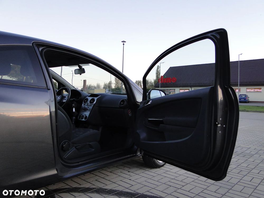 Opel Corsa 1.4 16V Active - 12