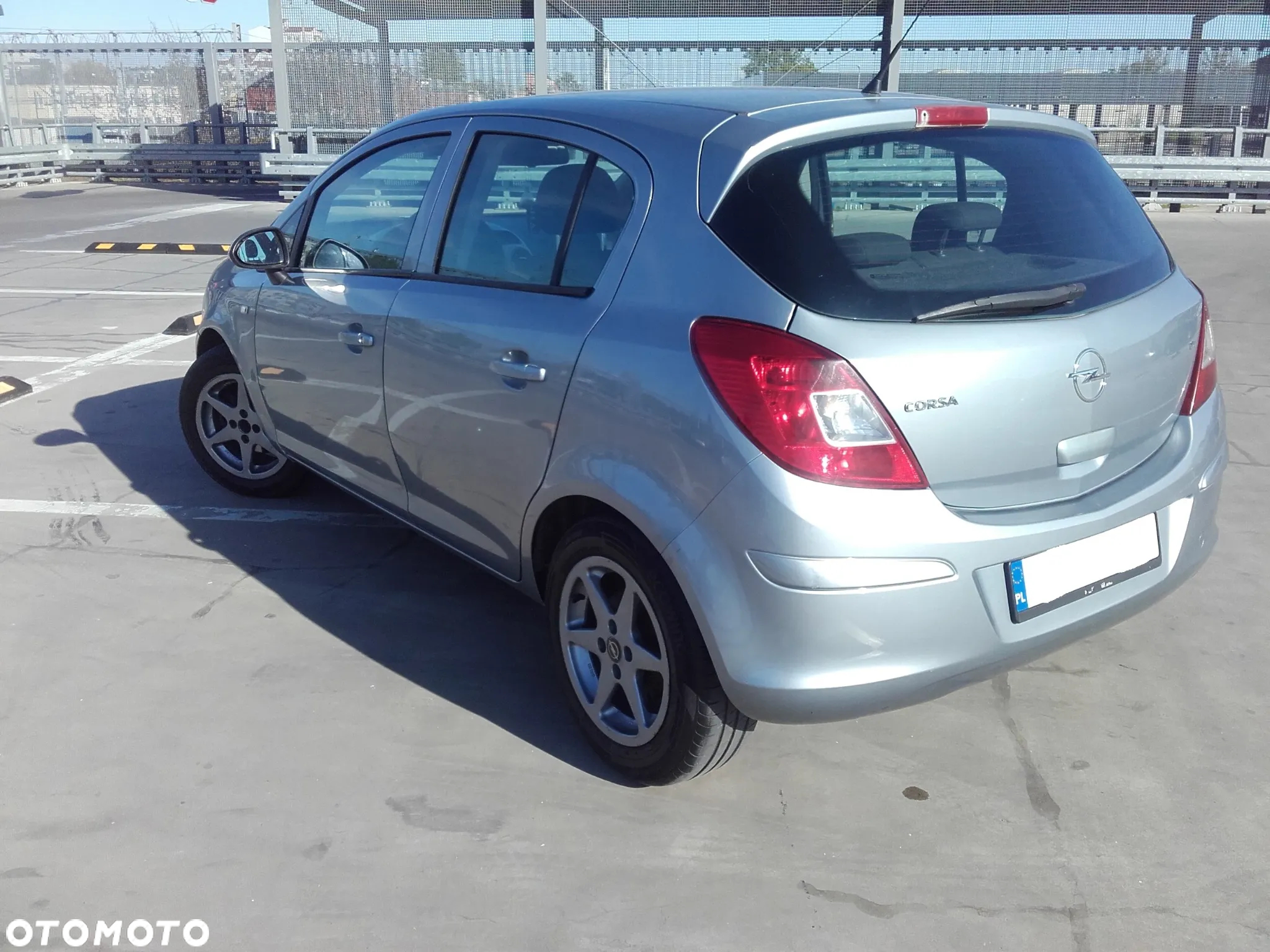 Opel Corsa 1.4 16V Cosmo - 13