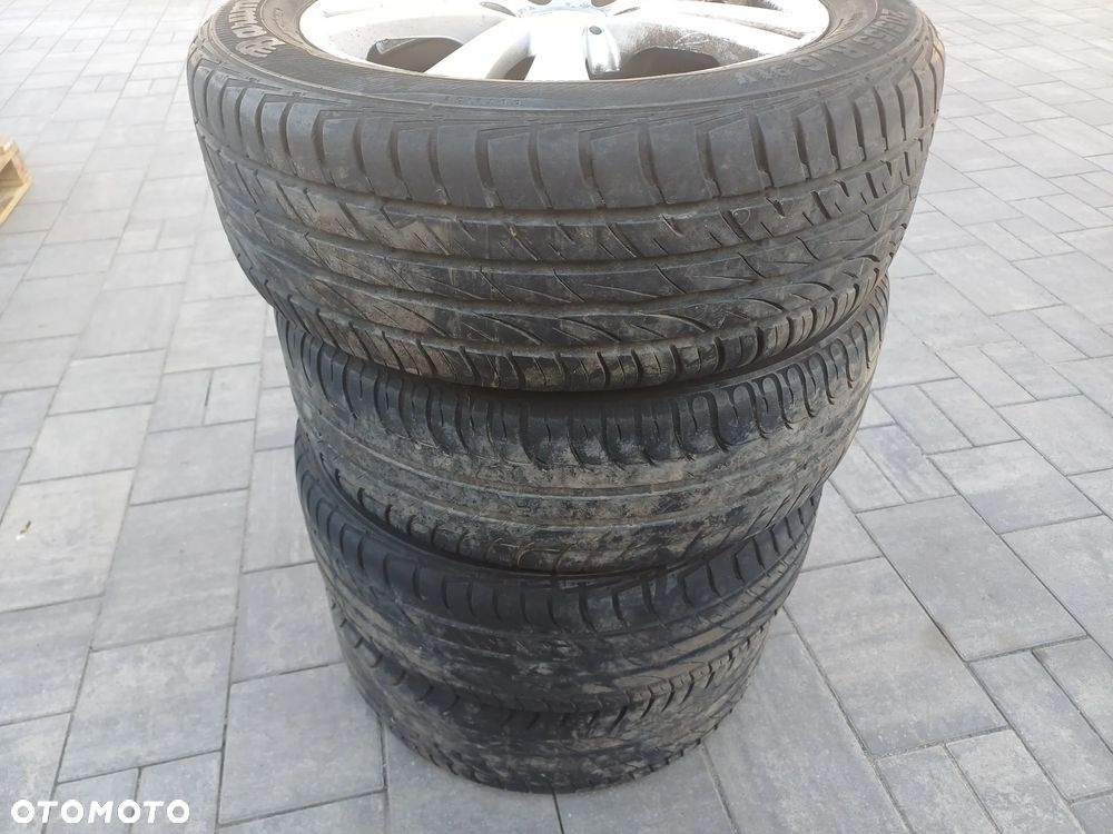 FELGI Z OPONAMI KOŁA ALUMINIOWE FLW VW SHARAN I R16 5X112 ET38 57,1 mm OPONY BRAVURIS 2 R16 205/55 LATO NR13 - 16