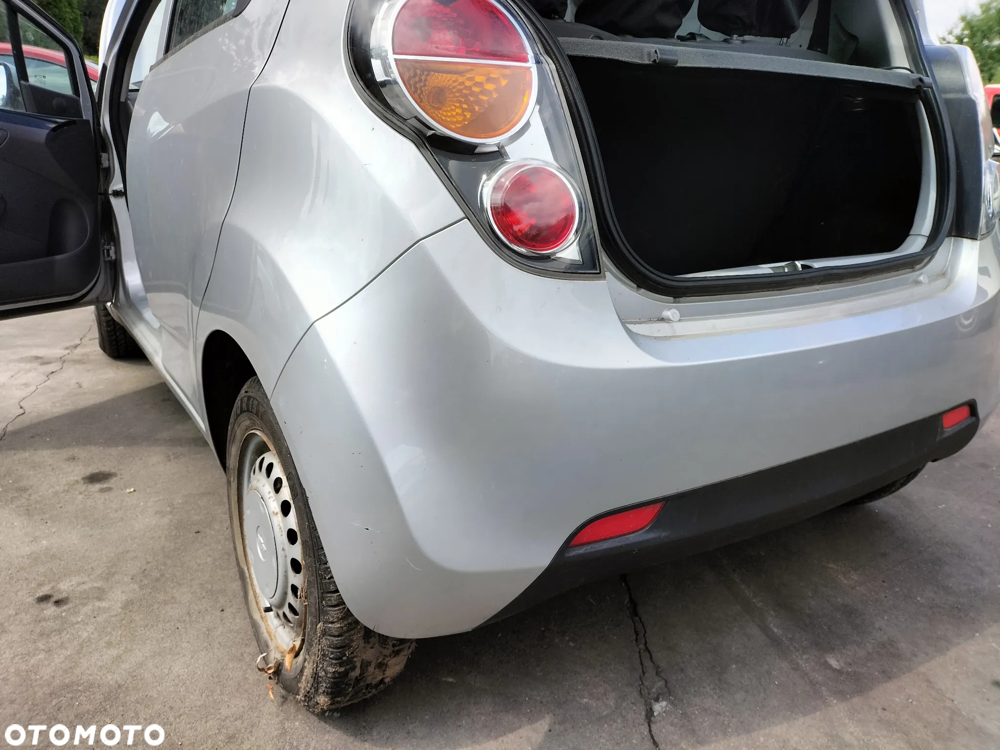 LAMPA LEWA PRAWA TYŁ CHEVROLET SPARK II 09-12r - 13