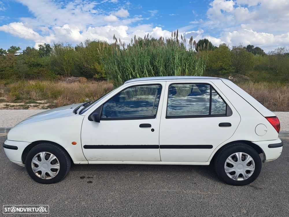Mazda 121 1.25 - 14