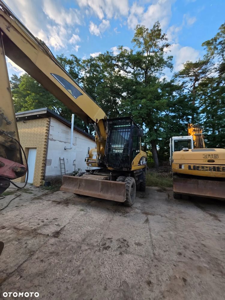 Caterpillar 318c - 16
