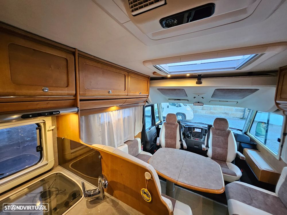 Rapido Le Randonneur 9097F CHASSI AL-KO Cama transversal + BASCULANTE - 24