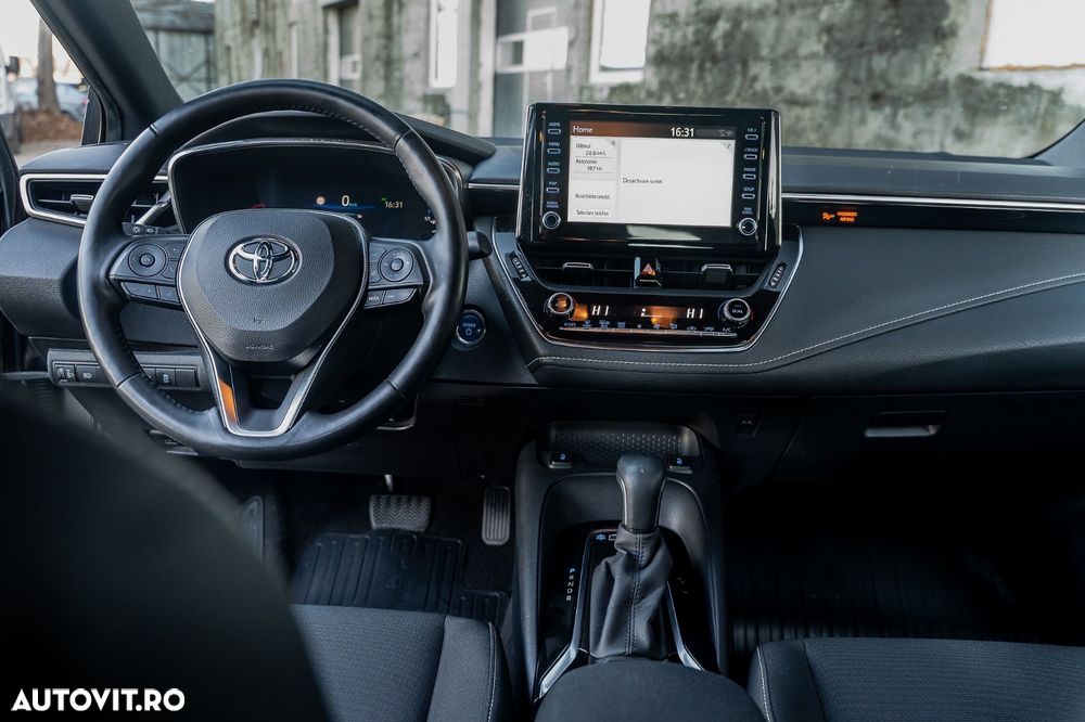 Toyota Corolla 1.8 HSD Exclusive - 13