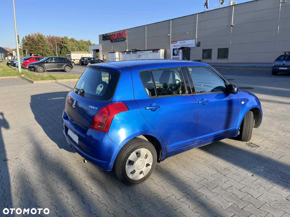 Suzuki Swift 1.3 Club - 3