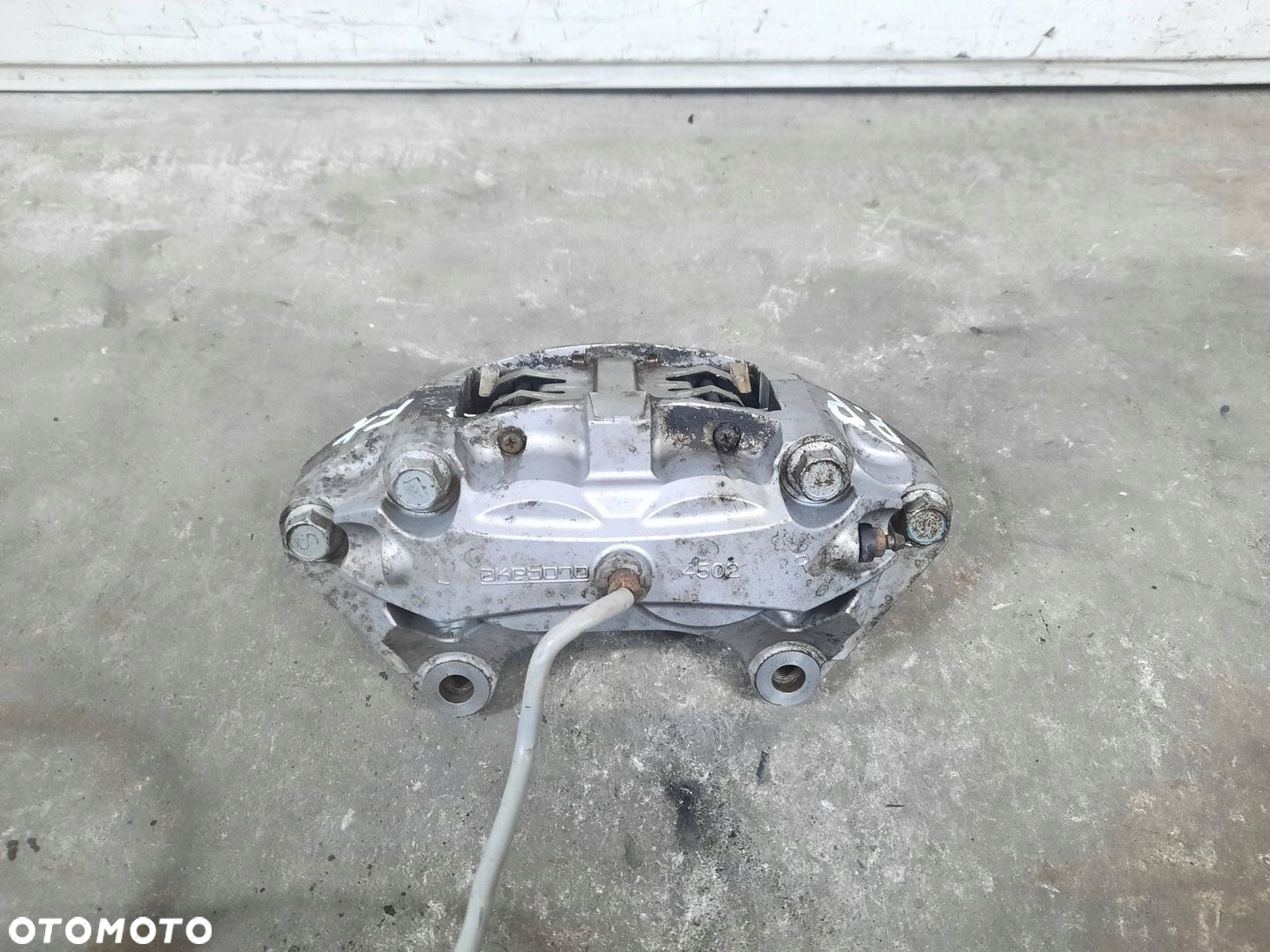 ZACISK HAMULCOWY PRAWY PRZÓD PRZEDNI INFINITI FX 30 II LIFT QX70 3.0D - 3
