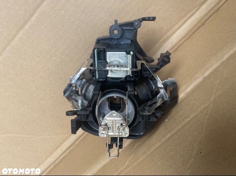 62611913 Soczewka lampy xenon bmw e90 e91 - 4
