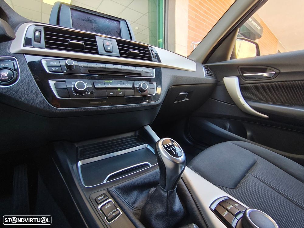 BMW 116 i Advantage — fotografia 7