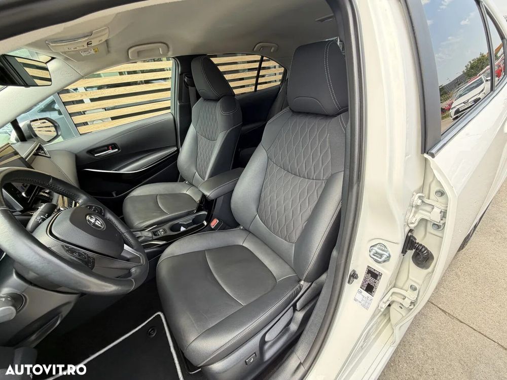 Toyota Corolla 1.8 HSD Exclusive - 19