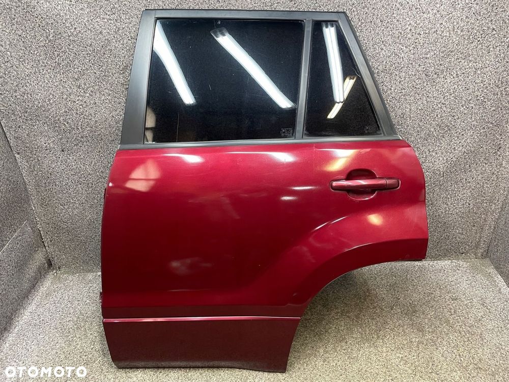 Drzwi lewy tyl lewe tylne listwa szyba ZY8 C13 Suzuki Grand Vitara 2 II - 1