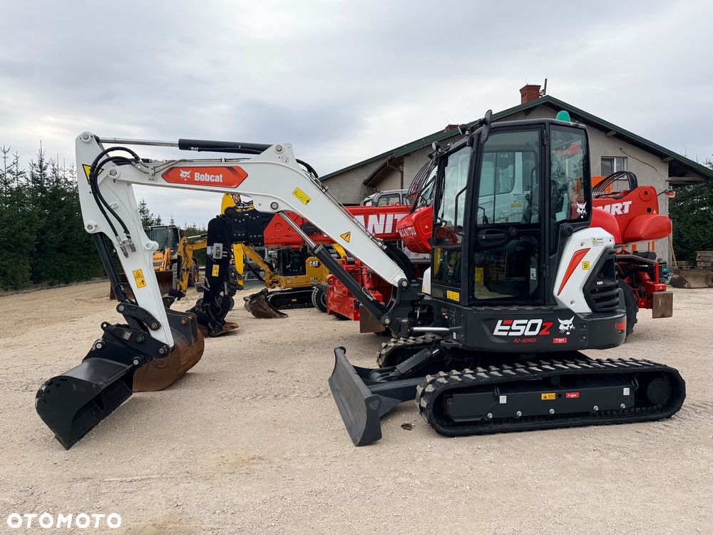 Bobcat Minikoparka Bobcat e50Z 5ton e55 e60 Cat 303.5 304  305 3xłyżki Ramię LOONG dodatkowe linie hydr wyjścia AUX1 + 2 przeciw waga MAX-dociążenie gąsienice 85% od nowości 1 właściciel z Niemiec Auto IDLEE po serwisie Widły wiertnica grabie i inne za dopłatą Szybkozłącze hydr Miller łyżka przedsiębierna Pług  Kubota Takeuchi Jcb - 35