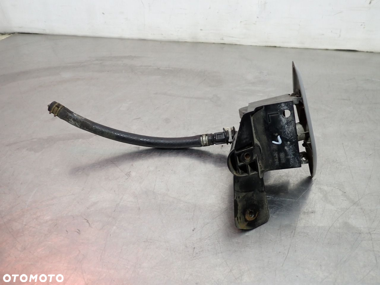 SPRYSKIWACZ LAMPY REFLEKTORA LEWY TOYOTA COROLLA E15 - 4