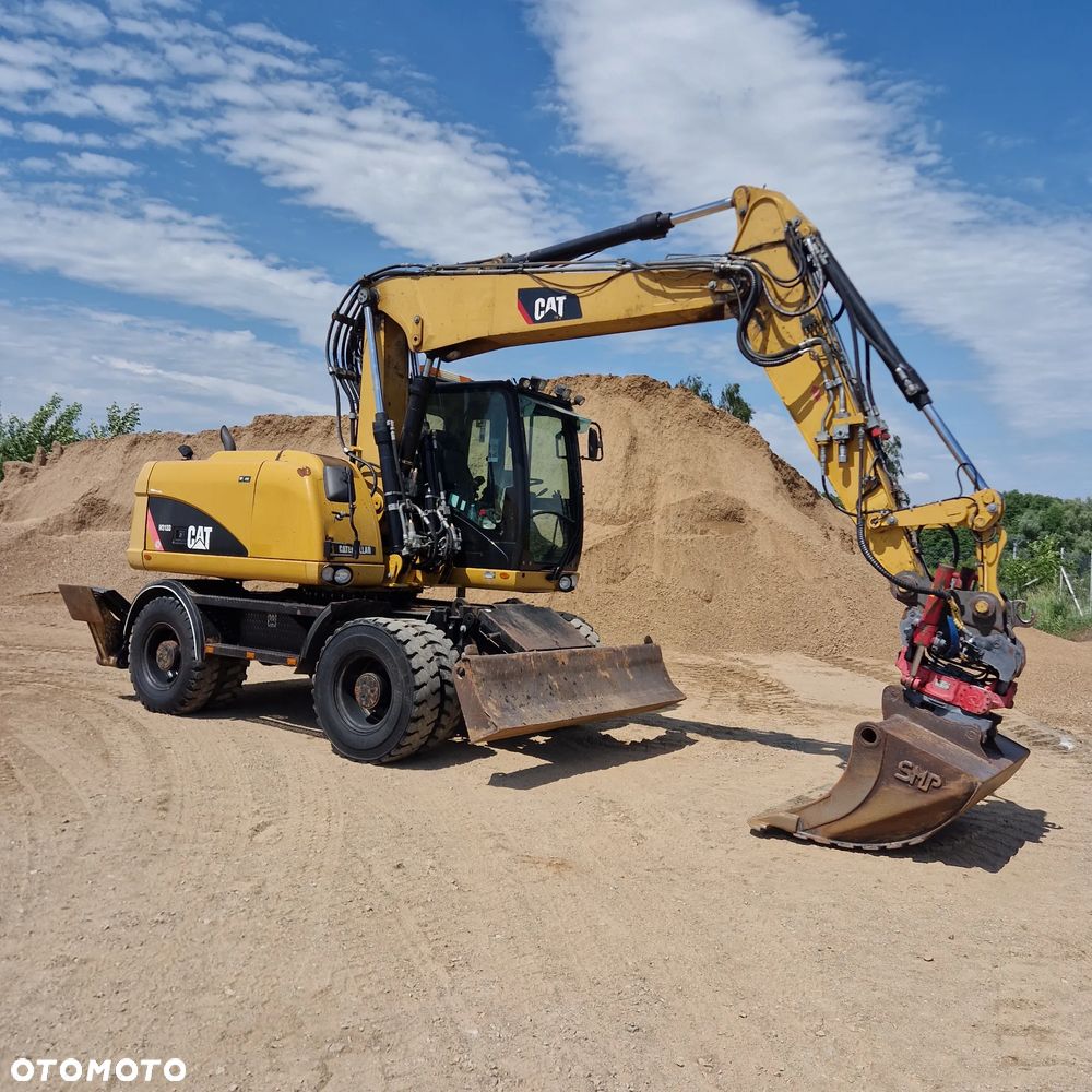 Caterpillar M313D - 1