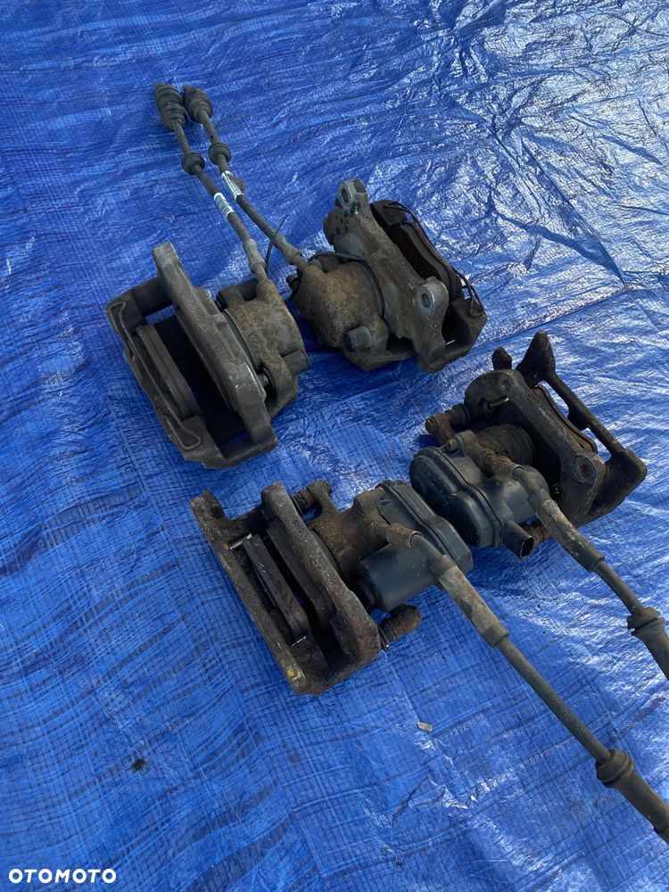 AUDI A4 B8 A5 8T Q5 2.0 TFSI ZACISK HAMULCOWY LEWY PRAWY TYŁ TYLNY KOMPLET  32335478 - 5