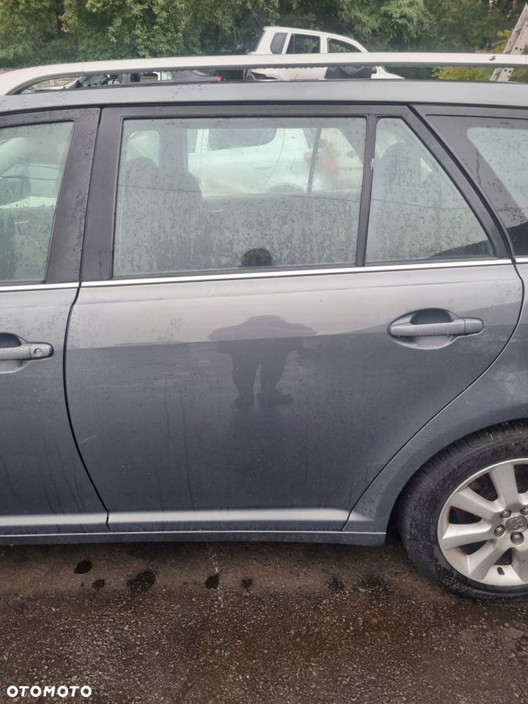 TOYOTA AVENSIS II T25 03-06 2004 r. KOMBI LAKIER 1E5 DRZWI LEWY TYŁ LT * - 1