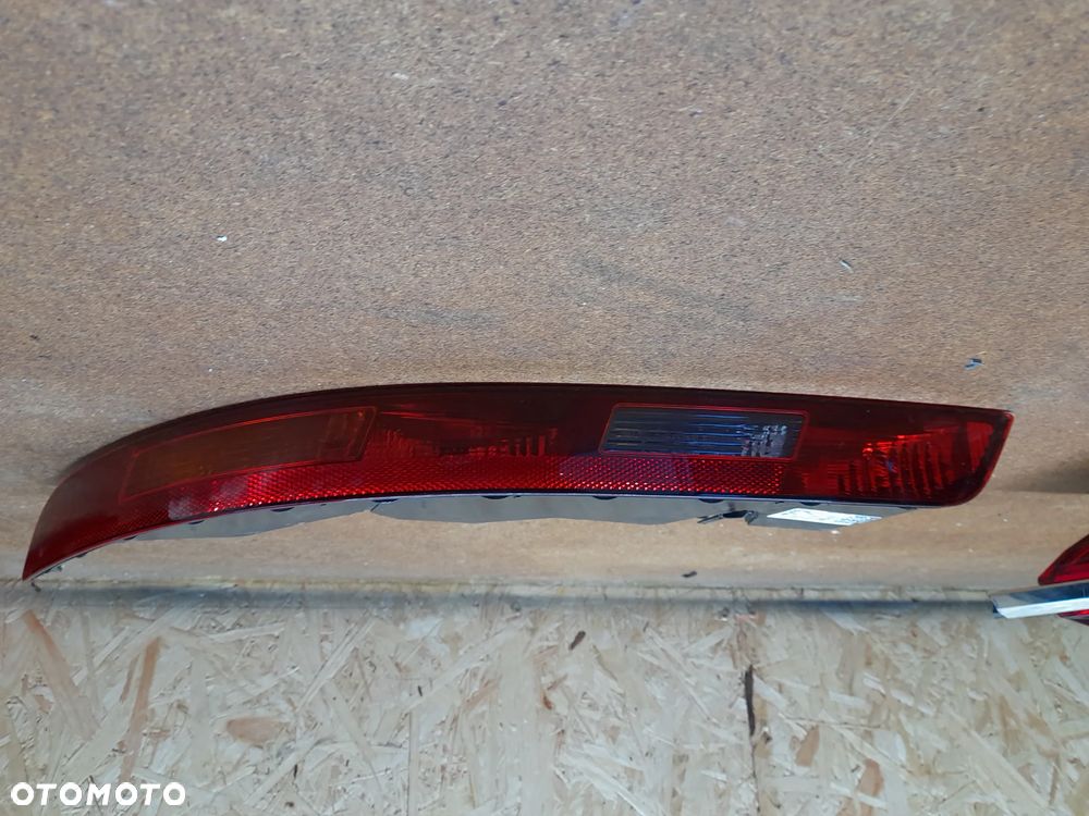 AUDI Q3 8U0 LAMPA TYLNA LEWA W ZDERZAK 8U0945095B - 1