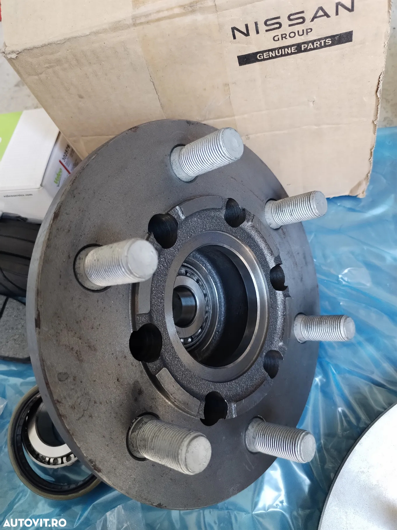 Butuc roata fata NISSAN ATLEON L35 ECO-T100 L35-09 EBRO L35-08 SEMERING ROATA RULMENTI DISC PLACUTE SURUBURI KIT PIVOTARE - 16