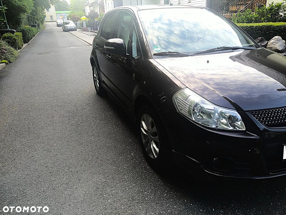 Suzuki SX4 1.6 Comfort Plus - 8