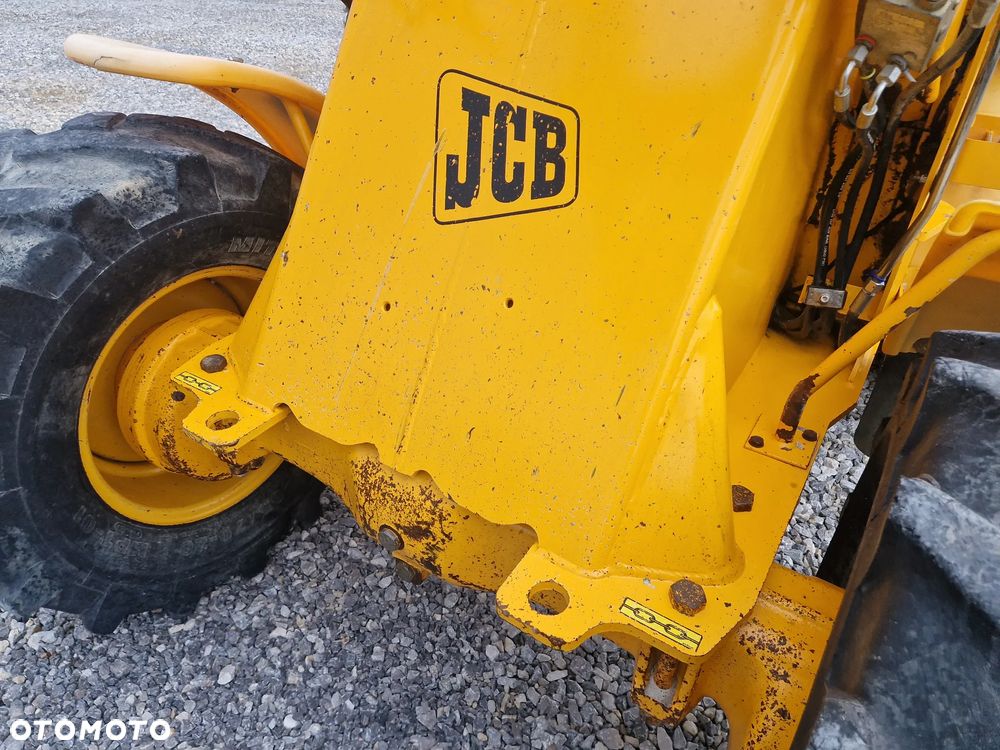JCB 409 - 13