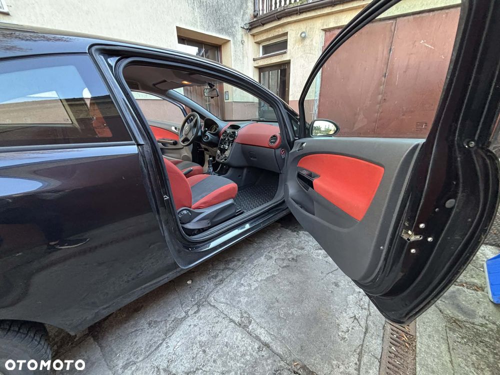 Opel Corsa 1.4 16V Enjoy - 14
