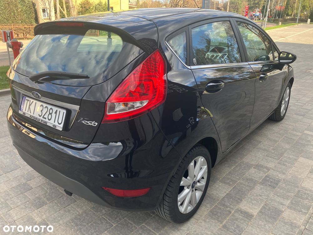 Ford Fiesta 1.4 Ghia - 4