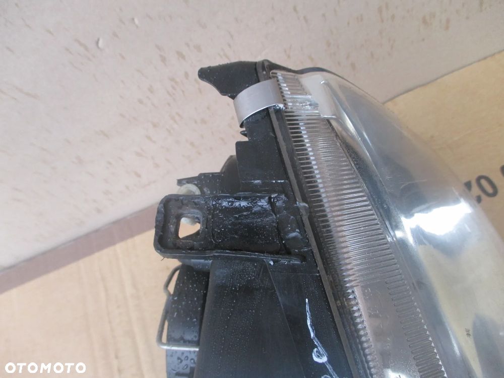 lampa lewa VW Bora Halogenowa Hella Europa - 4