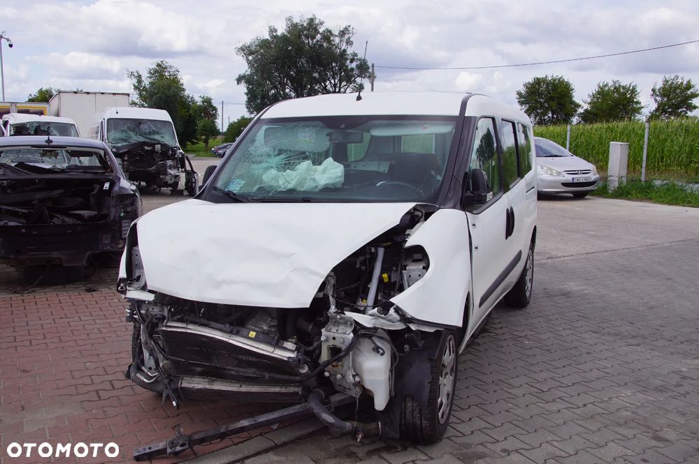 Auto na części - Fiat Doblo II Lift 1.4 T-Jet 120 KM 198A4000 M32 249 2018R Silnik Skrzynia Drzwi Szyba Zderzak Klapa Deska Kokpit Sterownik Moduł Licznik Kierownica - 1