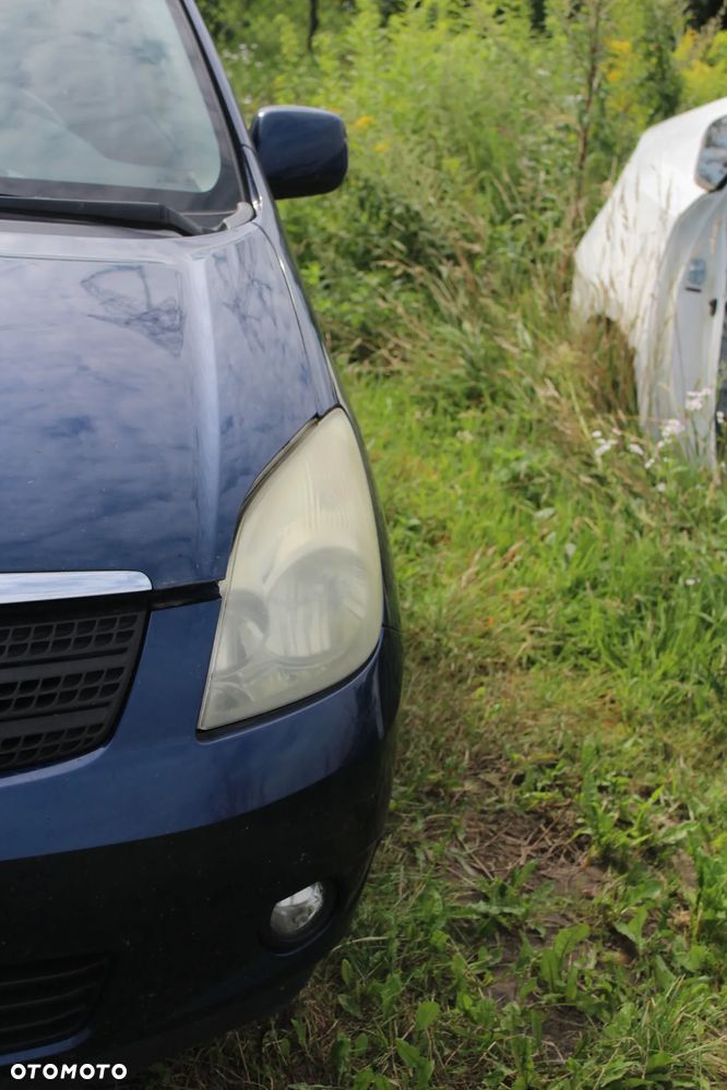 LAMPA LEWA LEWY PRZÓD COROLLA VRSO I 00-04R