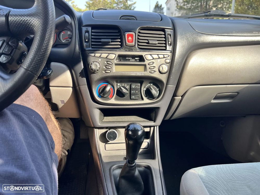 Nissan Almera 1.5 Comfort ABS+AC - 32
