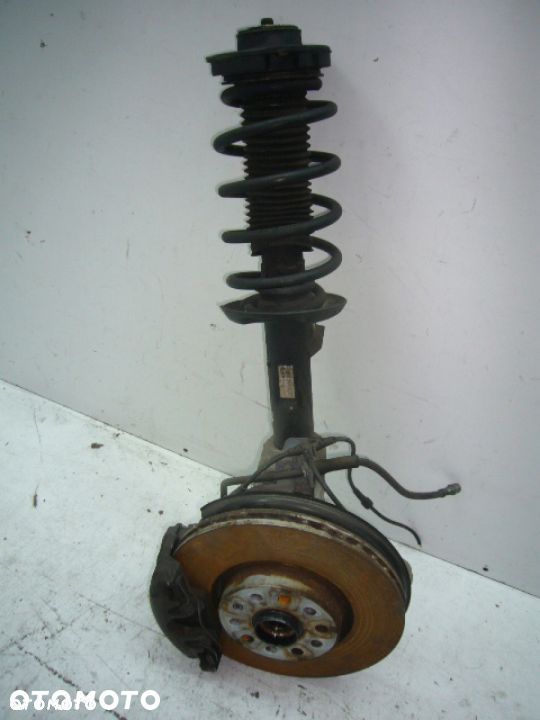 Vw Passat B7 Macpherson Zwrotnica Sprezyna Lewa - 1