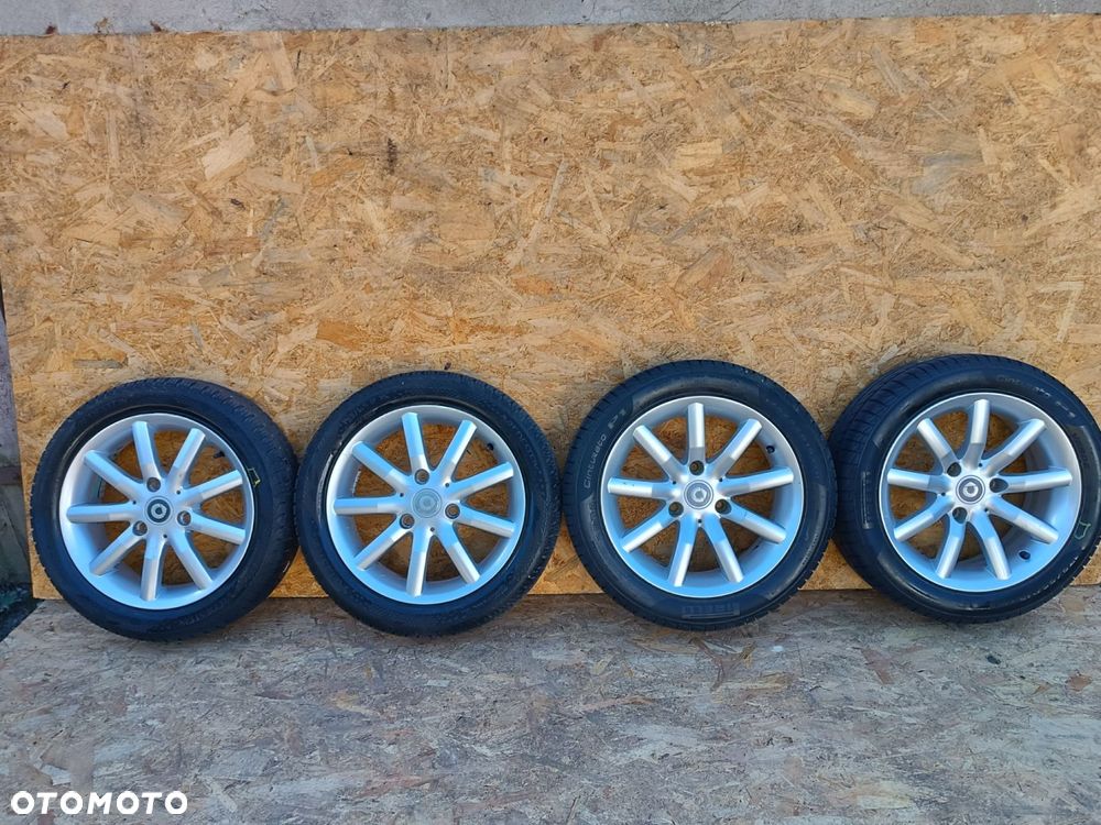 SMART FELGI ALUM CONTINENTALT SMART PIRELLI 225/40R16  5,5Jx15H2 ET1 6- 8mm 4SZT - 1