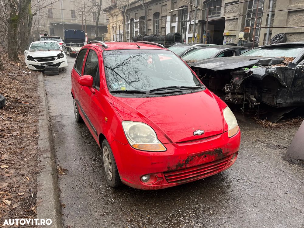 Dezmembrez Chevrolet Spark culoare rosu motor benzina 2008 - 2