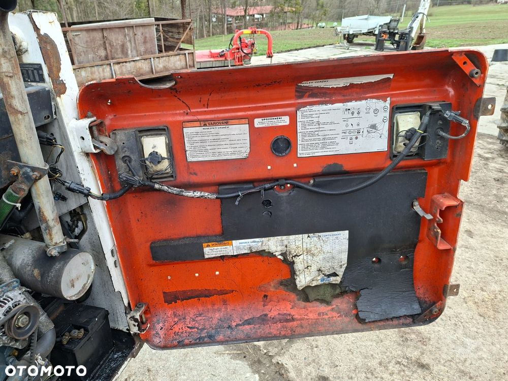 Bobcat 553 4X4 + Melroe Ingersoll-Rand 725S B/H - 38