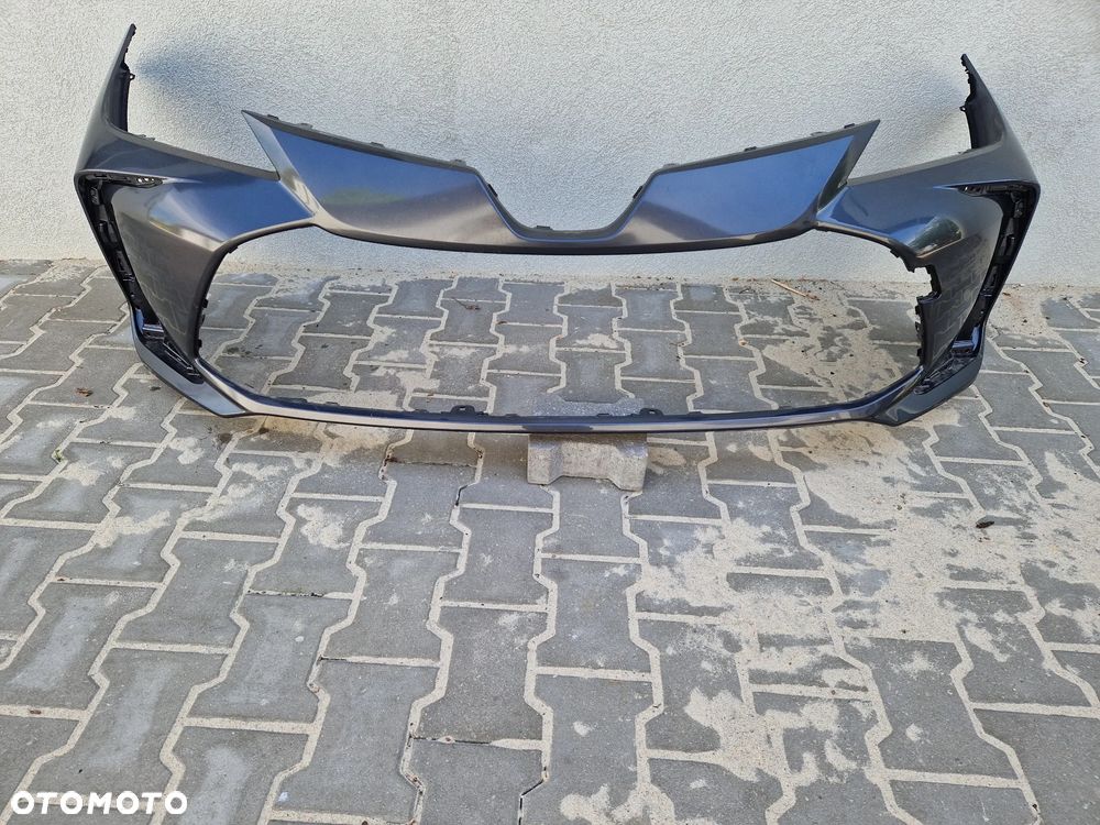 Zderzak Toyota Corolla XII E210 E21 sedan  bez dziur - 1