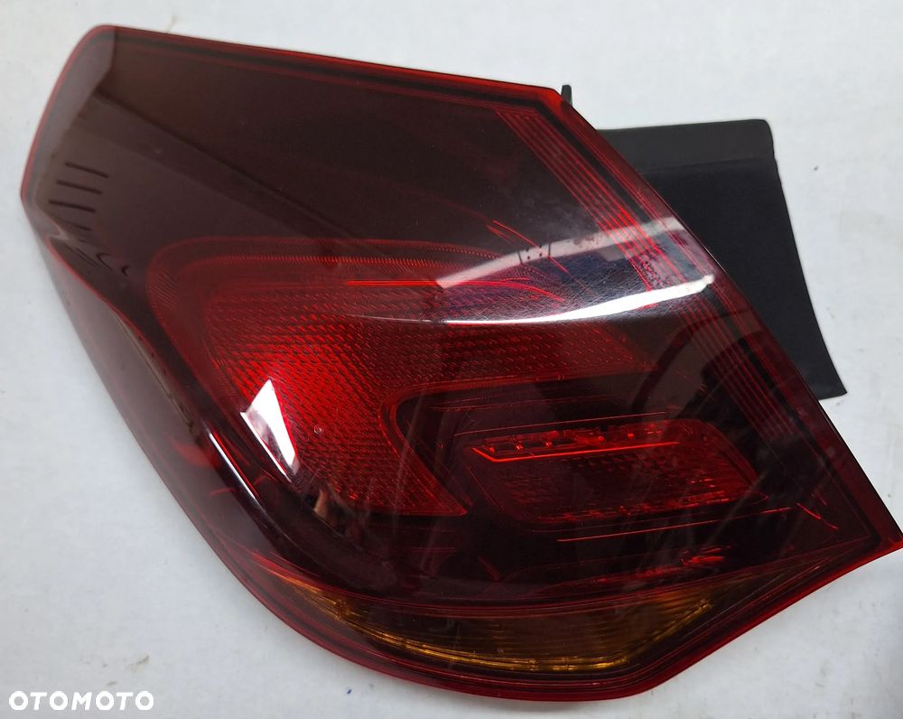 LAMPA TYLNA LEWA -OPEL ASTRA J HATCHBACK/5 DRZWI