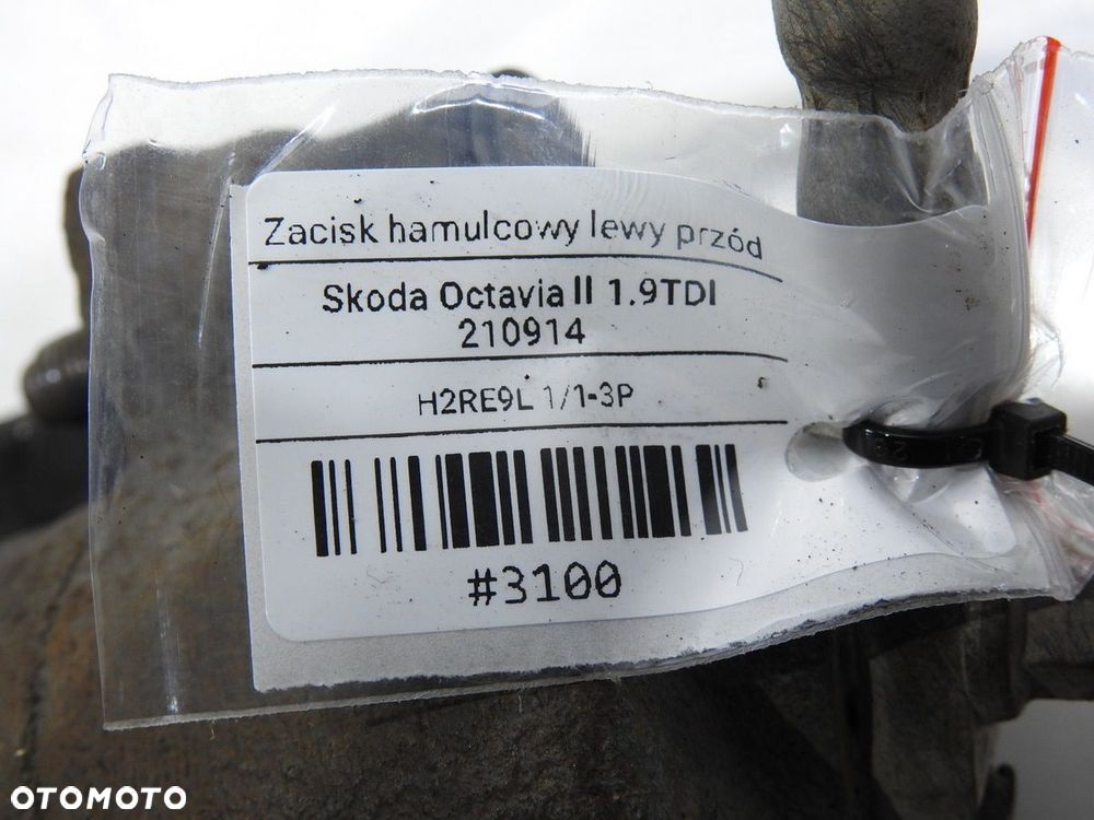 ZACISK HAMULCOWY LEWY PRZÓD SKODA OCTAVIA II - 9