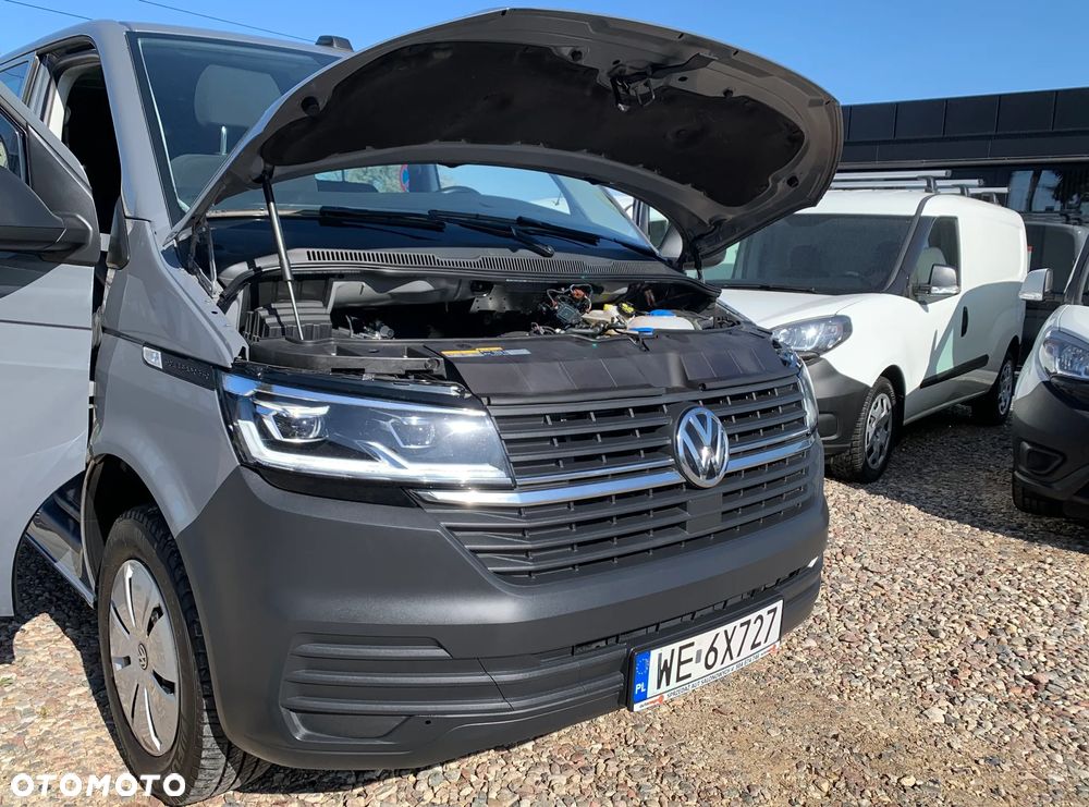 Volkswagen TRANSPORTER T6 TRWAŁY TDI SILNIK DNA 2.0TDI MOC 150KM DSG 7 MOCNA SKRZYNIA DQ-500 AUTOMAT, ZABUDOWA KOMBI VAN MINIBUS SPECJALNA CARAVELLE Reflektory FULL-LED Przód,  Lampy FULL-LED Tył, Kamera, Radar, Czujniki zmiany pasa, 2x boczne drzwi przesuwne! Aktywny tempomat, Podgrzewane fotele, Dwustrefowa Klimatyzacja i ogrzewanie! Fabryczne oryginał WEBASTO 5kW THERMO COMFORT SE Szybkie nagrzewanie silnika zimą! Ilość miejsc 9 osobowy - 35