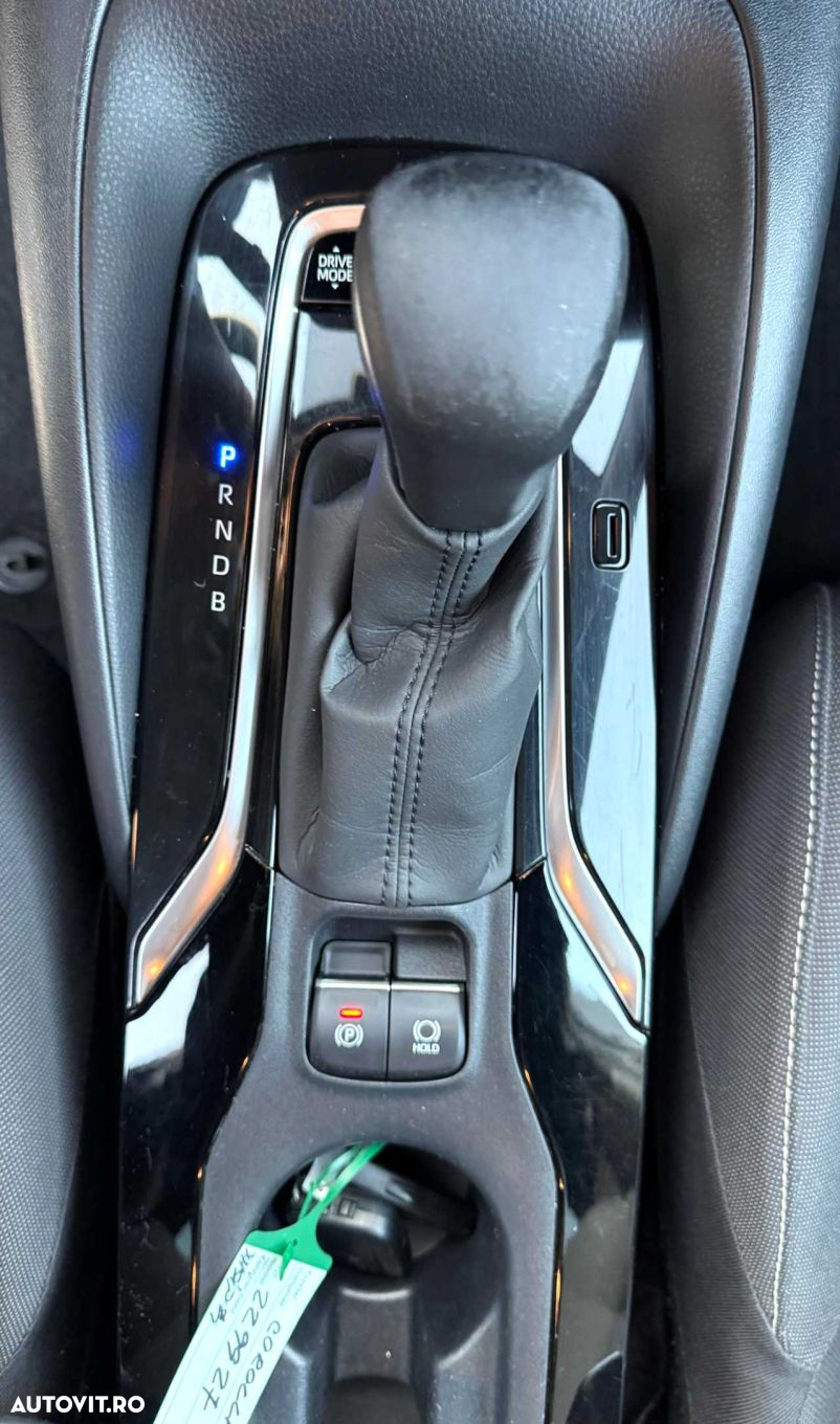 Toyota Corolla 1.8 HSD Exclusive - 23