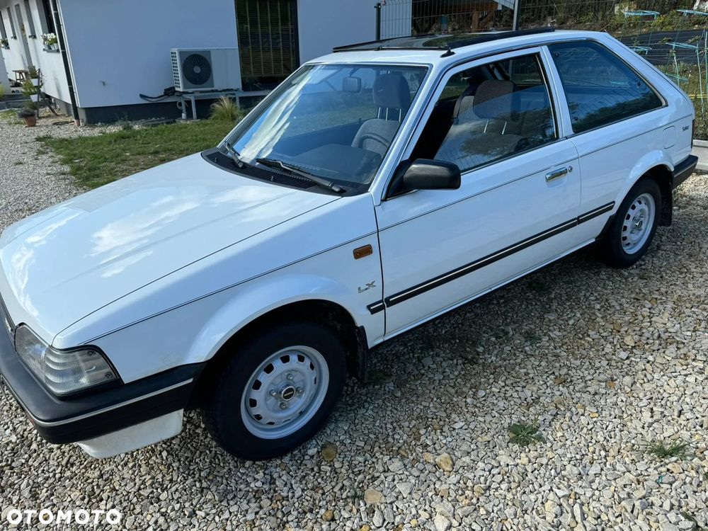 Mazda 323 1.3 LX - 13