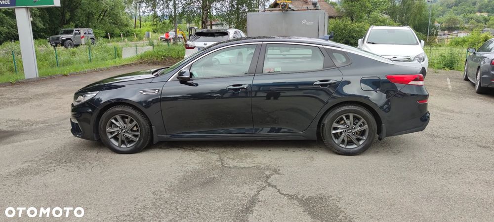 Kia Optima 2.0 M - 13
