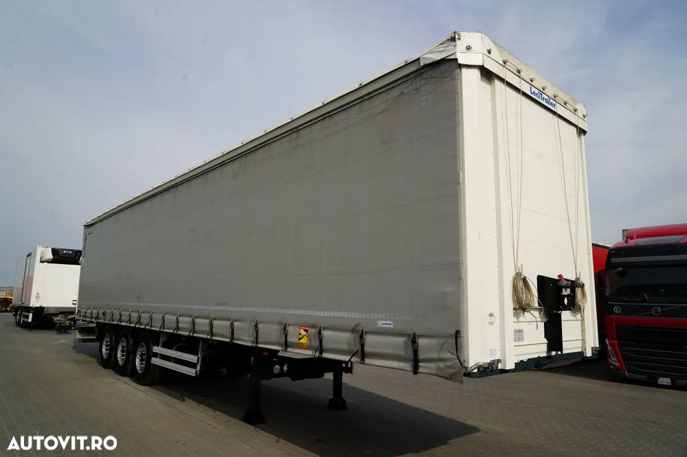 LeciTrailer CORTINĂ / STANDARD / PODEA PUTERNICĂ / AXĂ RIDICATĂ / ANVELOPE 100% / AXE - 2