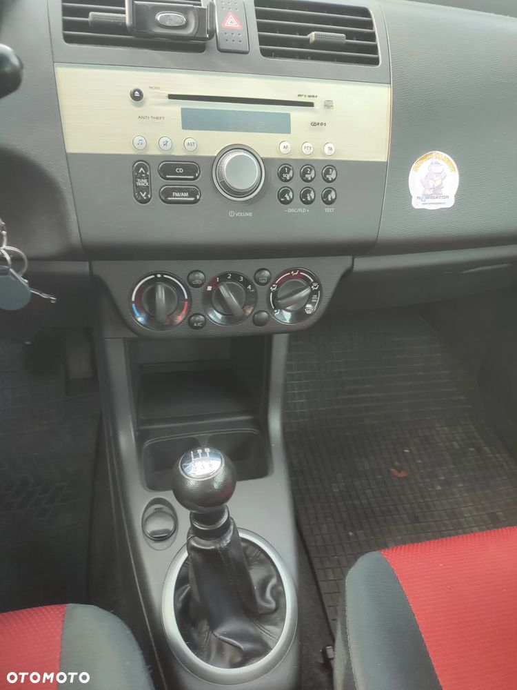 Suzuki Swift 1.3 Club - 9